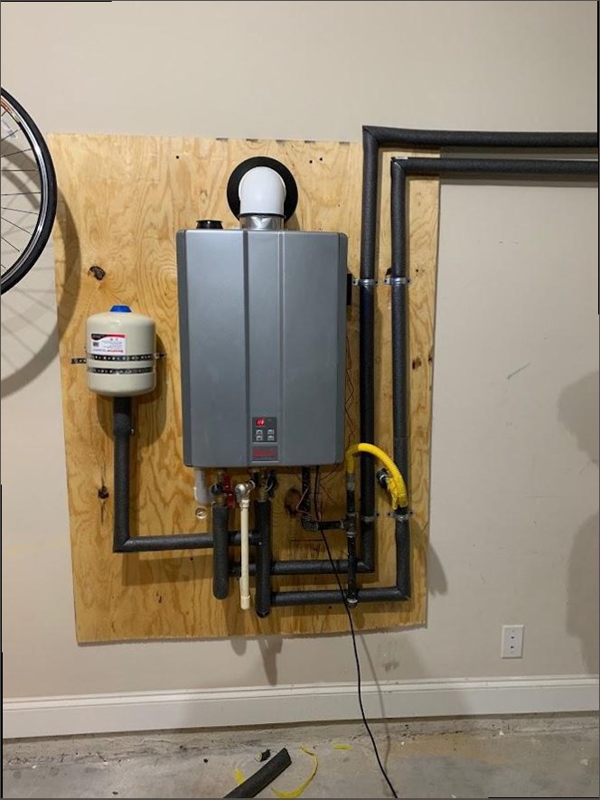 Tankless water heater installation with expansion tank