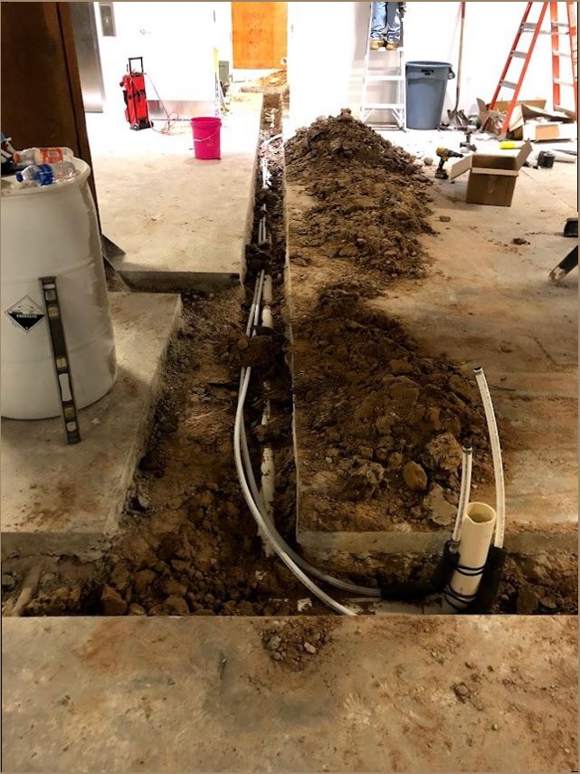 Slab plumbing work with new PVC lines